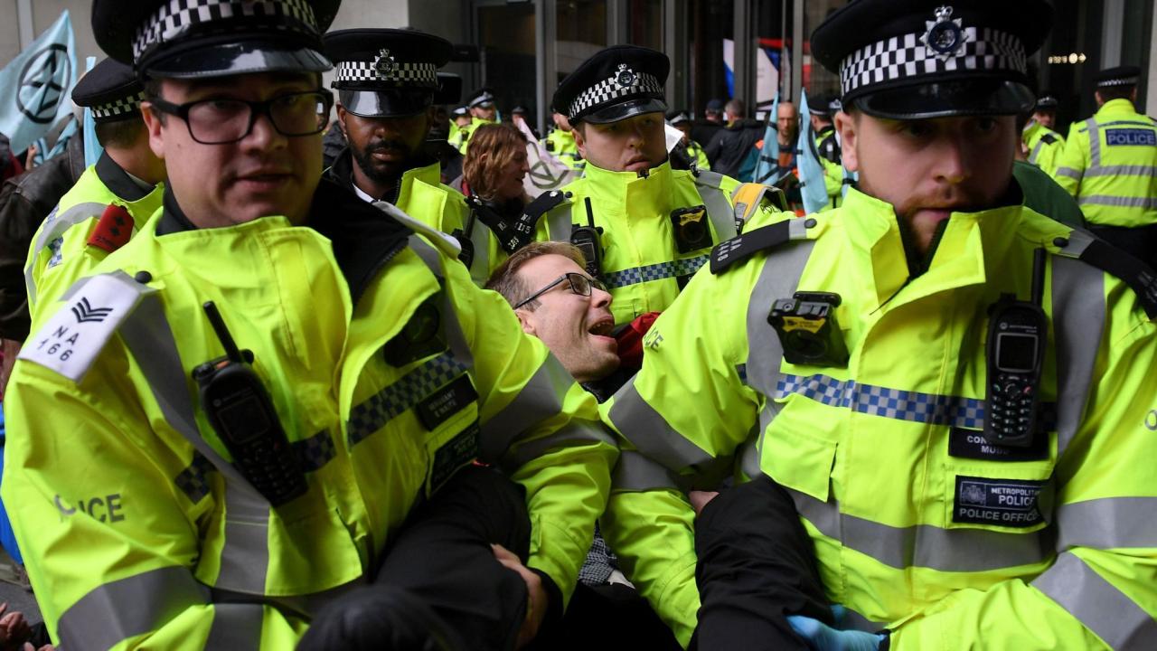 Rebellion extinction climate sadiq khan protests protester outside informed ban chief stretched London underground tube wi fi down shut off protests extinction rebellion